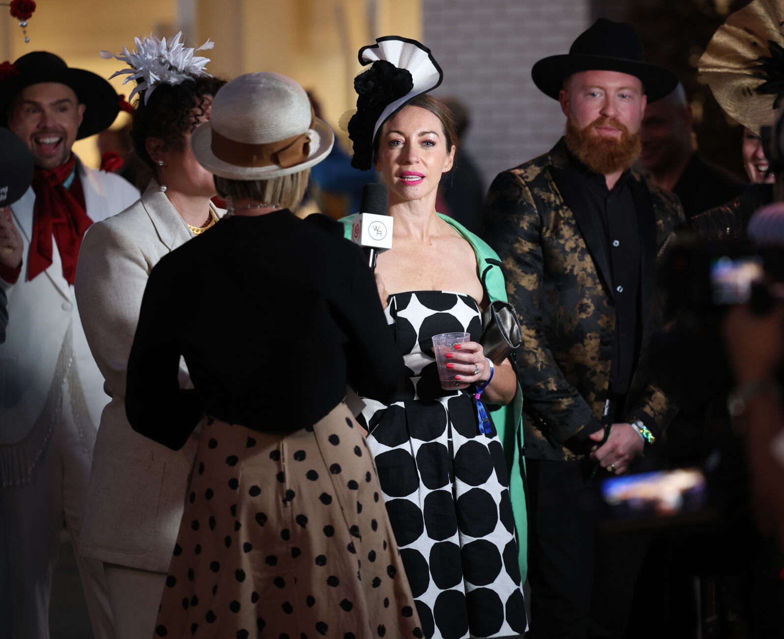 Woman interviewed during Opening Night.JPG